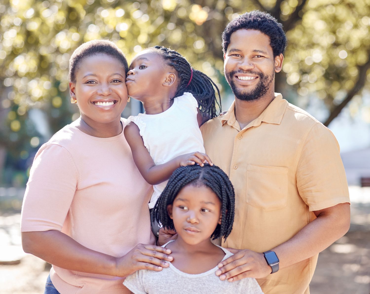 black family smiling for a picture